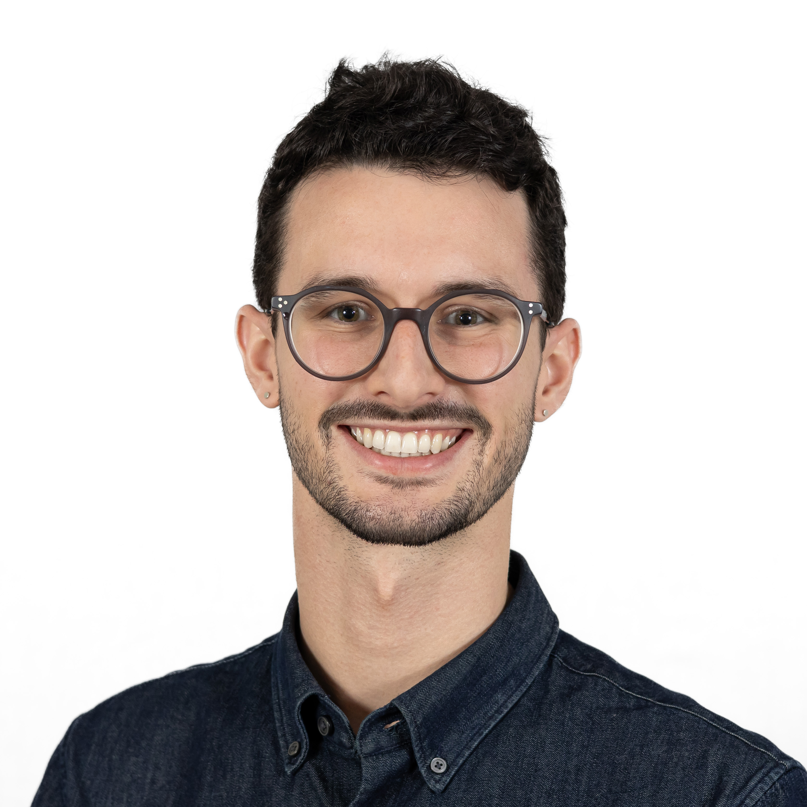 Griffen's smiling bespectacled face